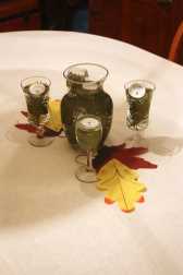 Table set with holiday centerpiece.