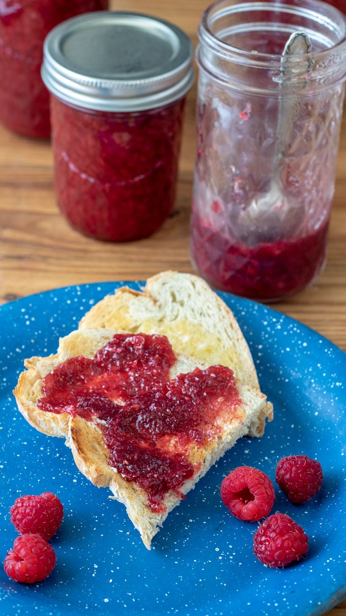 Jam on toast on blue plate.