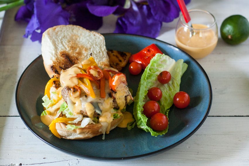 open faced turkey burger on blue plate