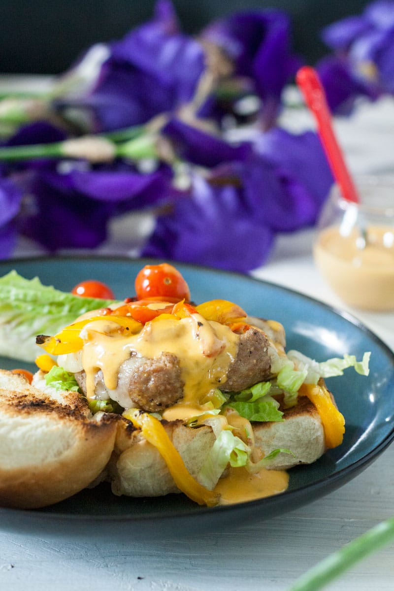 open faced turky burger loaded with cheese and chipotle sauce for 4th of july recipe