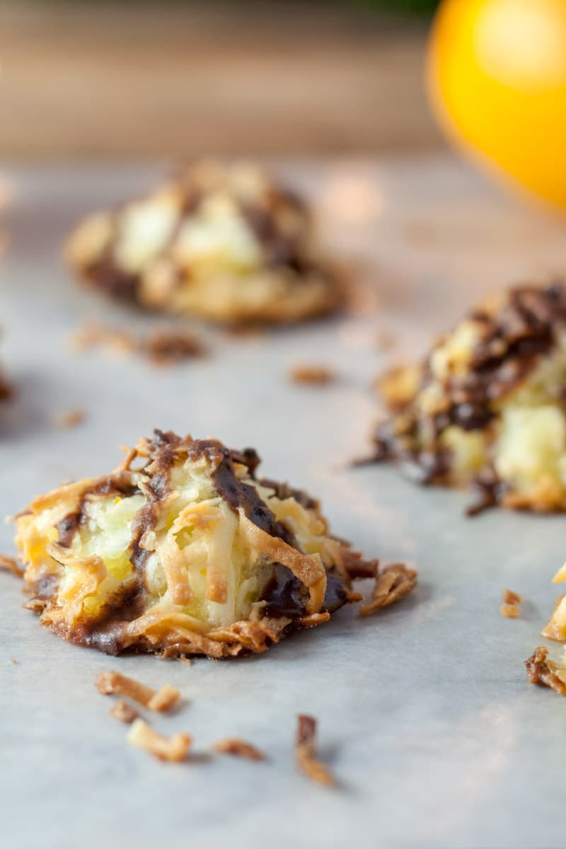 Close up of Golden brown ambrosia macaroons with oranges
