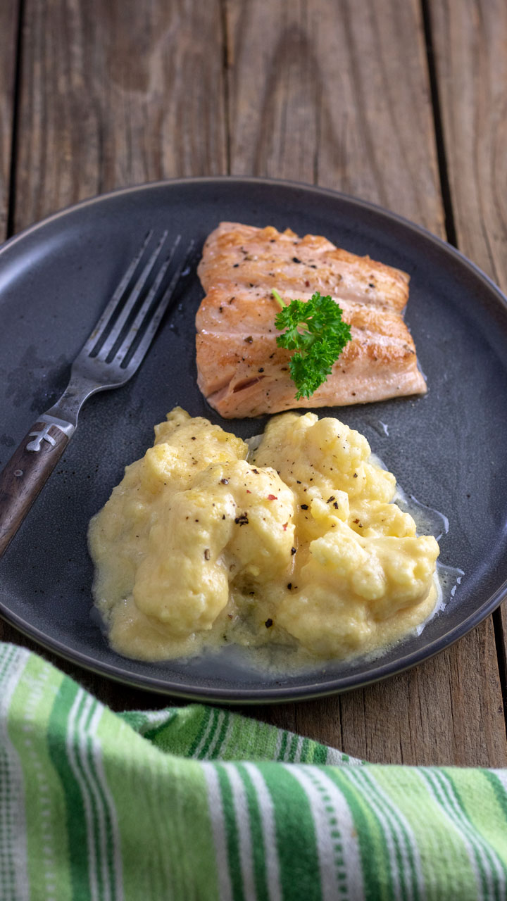 Cauliflower and cheese sauce with salmon.
