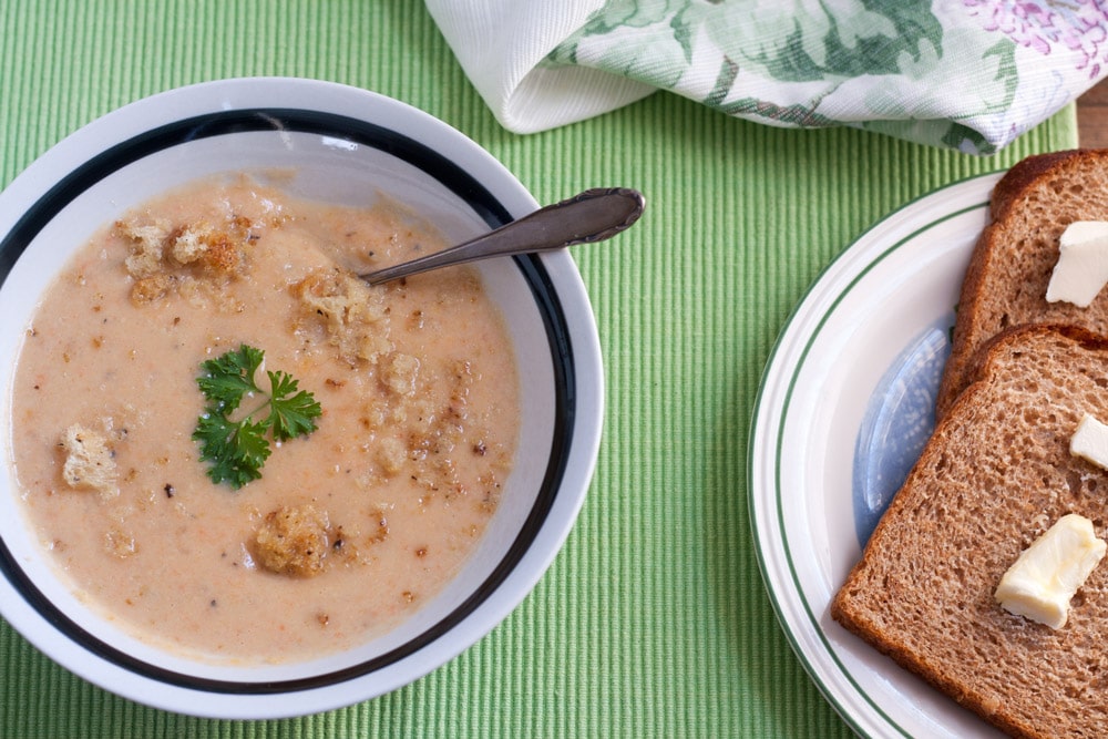 cauliflower cheese soup with bread and butter