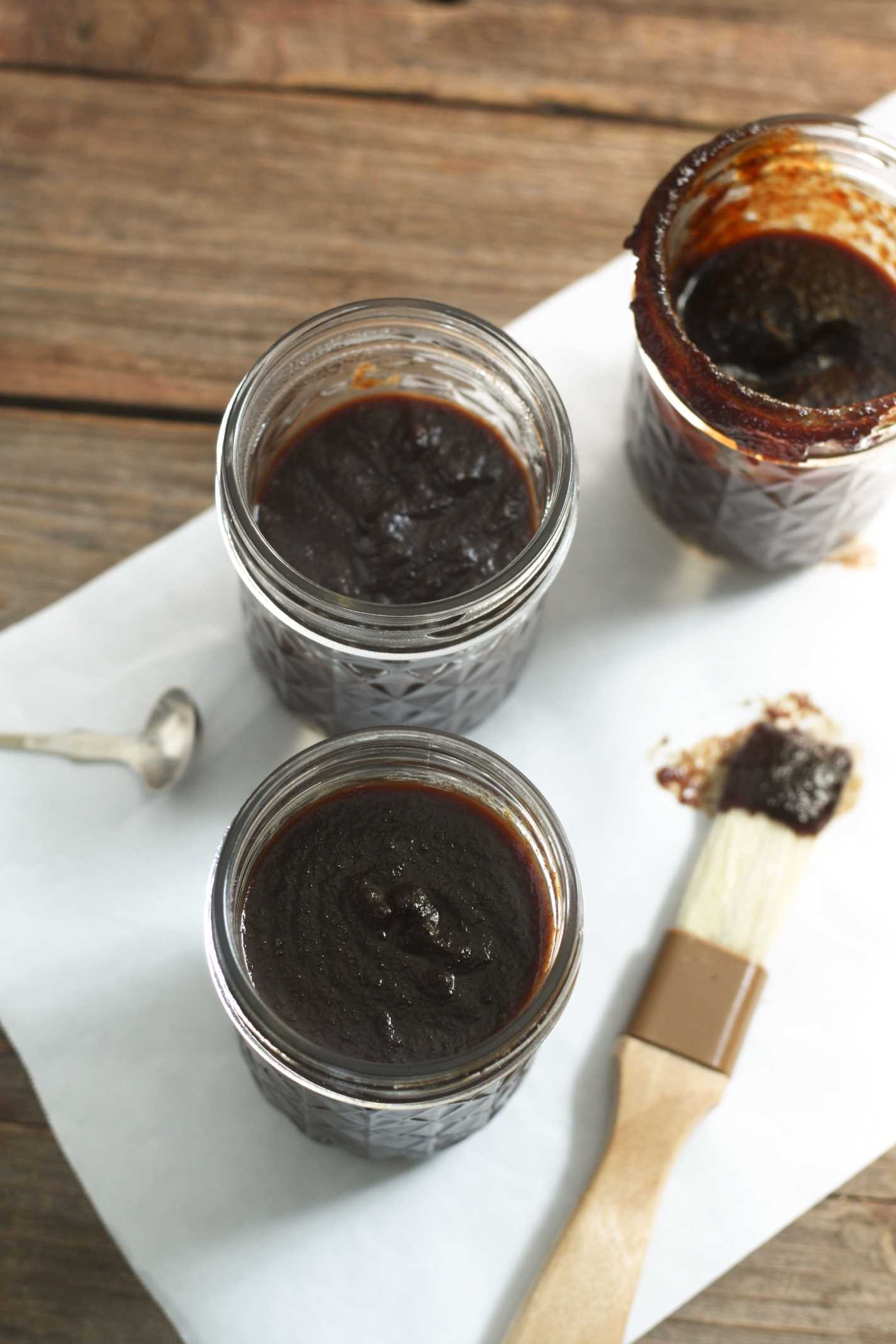 Cherry BBQ Sauce jar with brush dipped in sauce