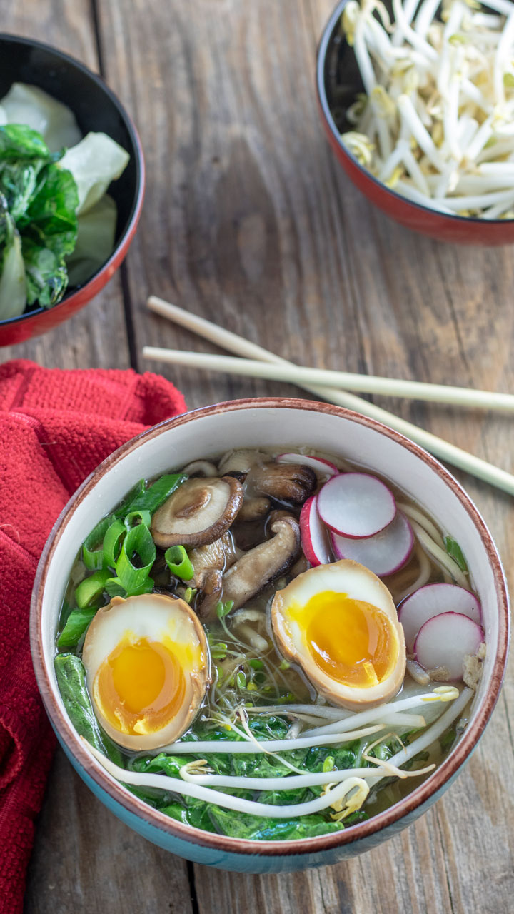 Chicken Ramen Soup with toppings in blue bowl.
