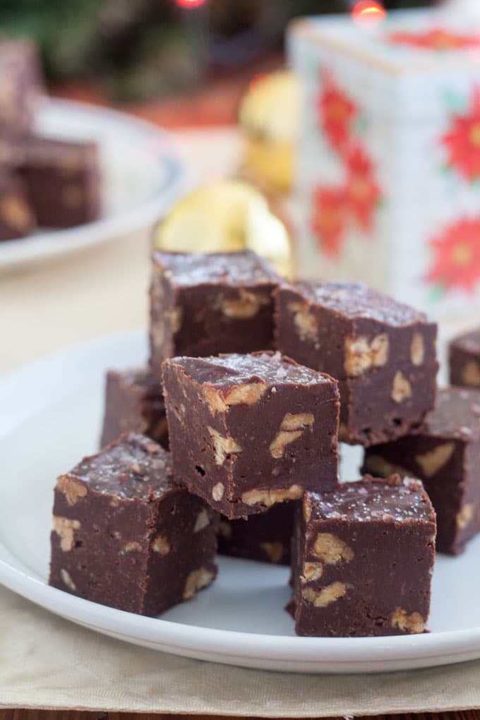Chocolate fudge piled on white plate