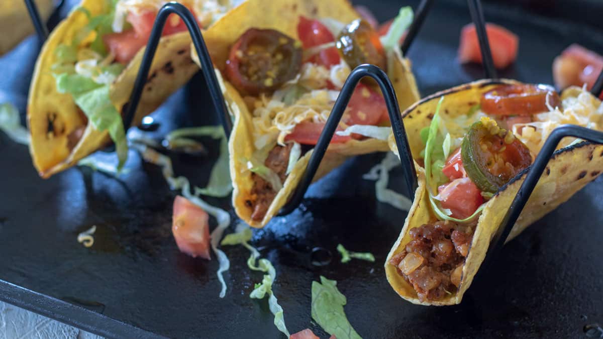 3 tacos in taco holder.