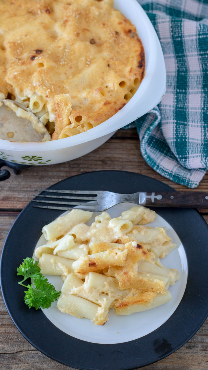 Mac and cheese on white plate.