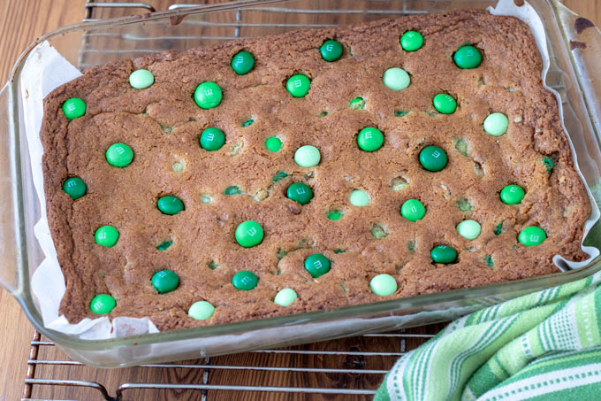 M&M cookie bars in glass baking pan