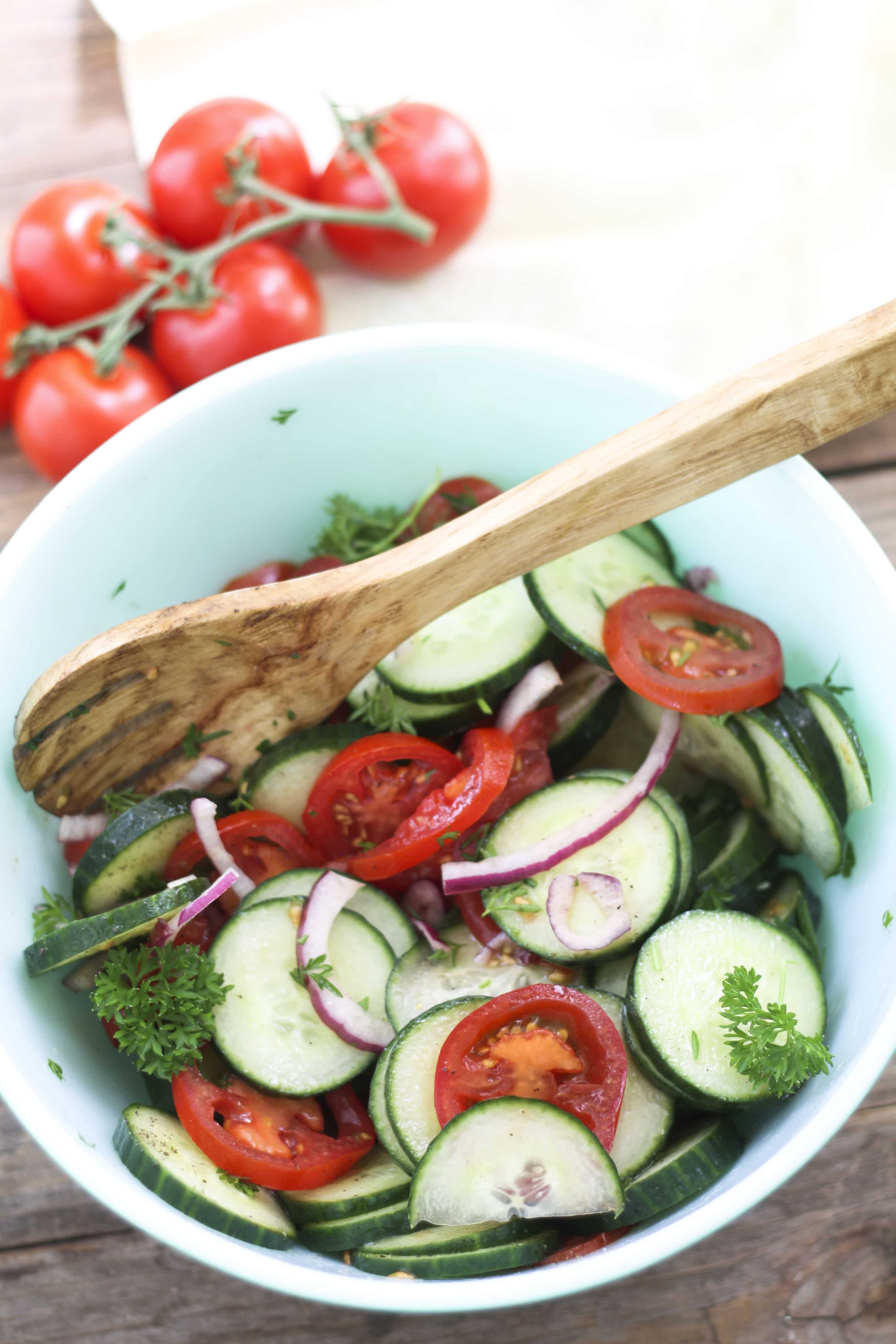red bowl with cucumber and tomato salad for 4th of July recipe