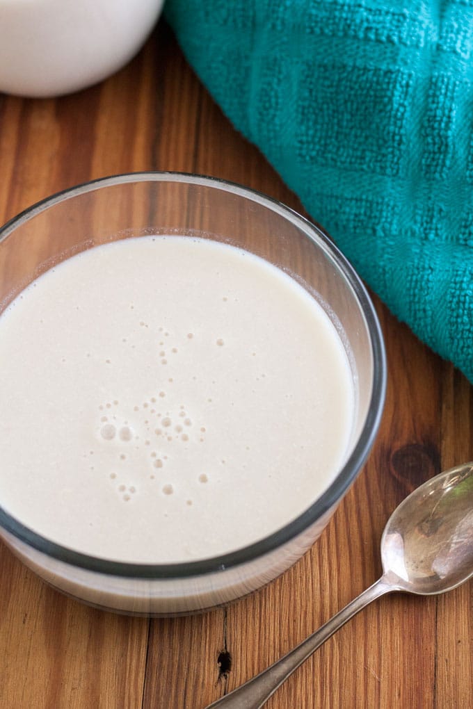 overhead photo of bowl of dairy free evaporated milk