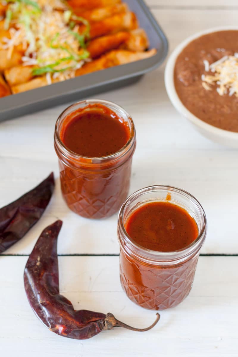 jars of enchilada sauce with refried beans