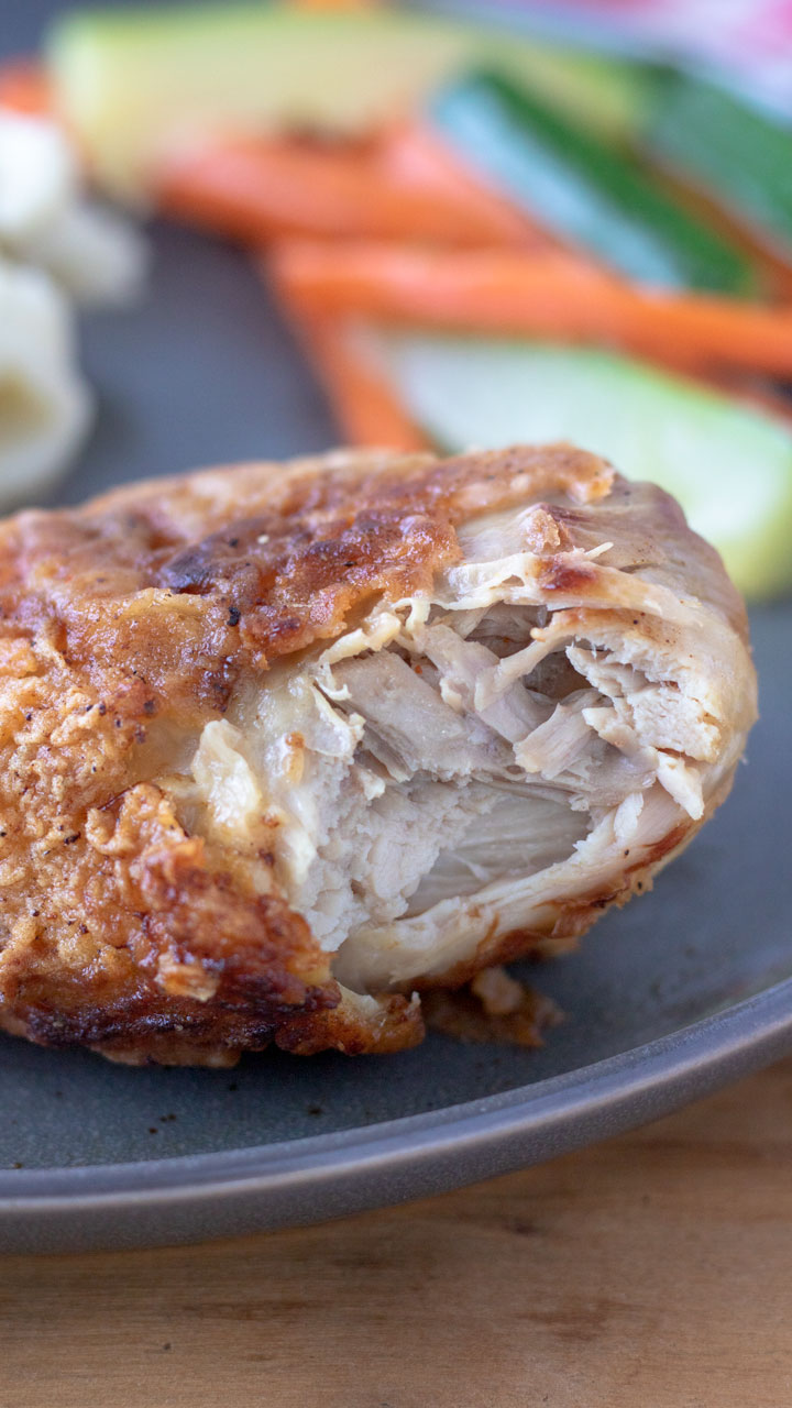 Chicken leg with bite taken out.