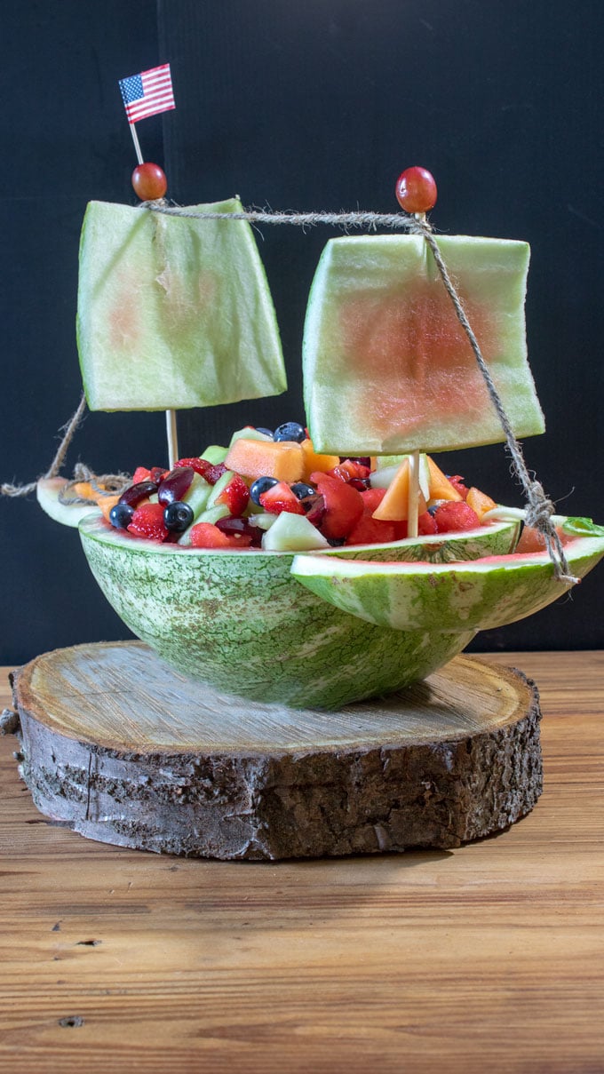 fruit salad in carved ship