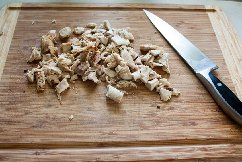 diced chicken on cutting board