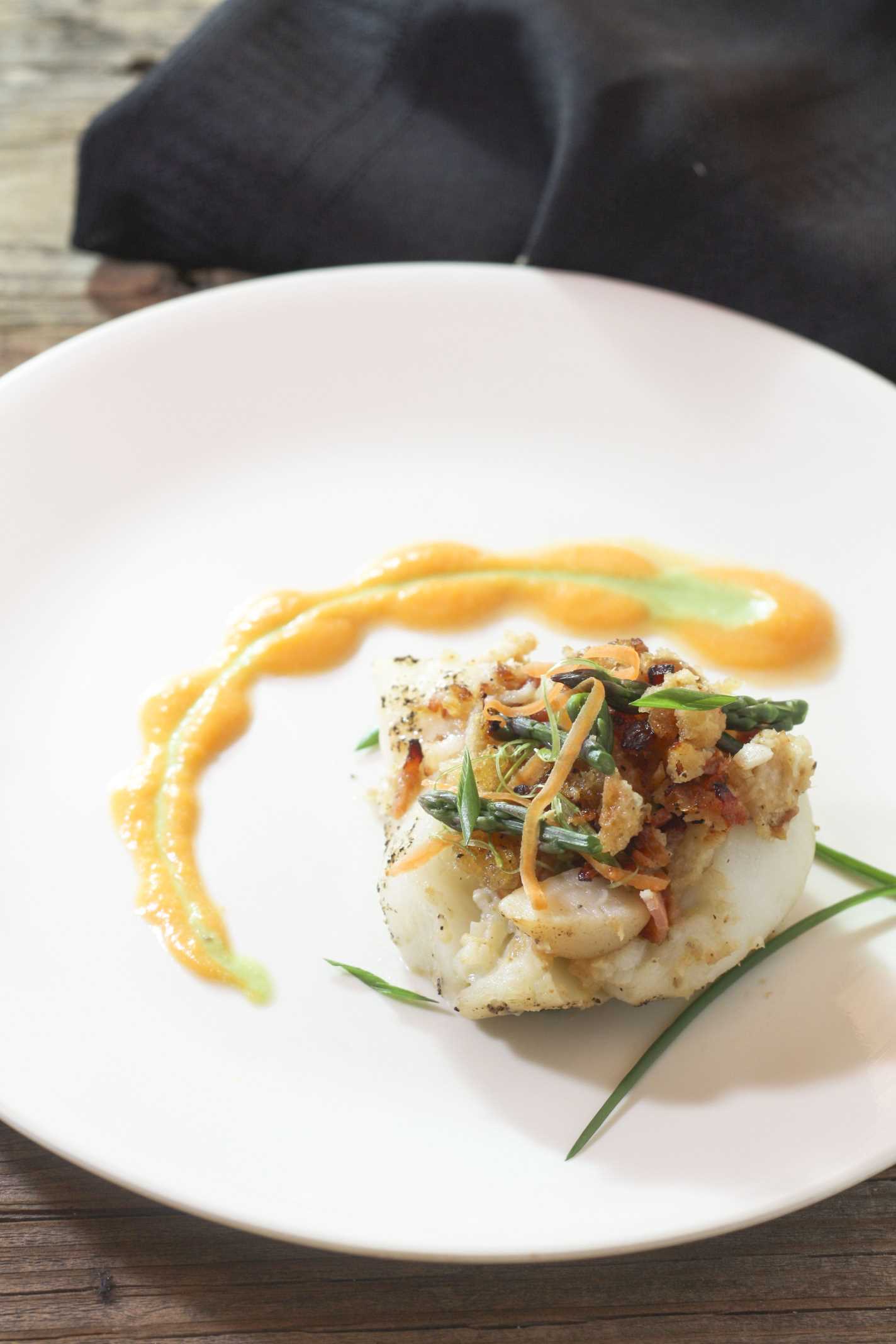 Bacon Horseradish Lobster Stuffed Grouper topped with fine asparagus tips