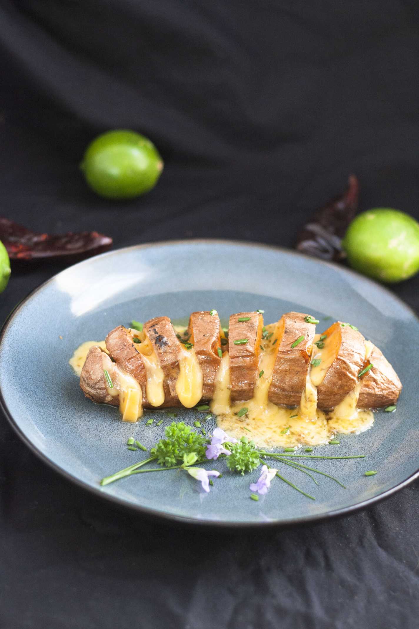 Hasselbeck Style Sweet Potatoes on blue plate 