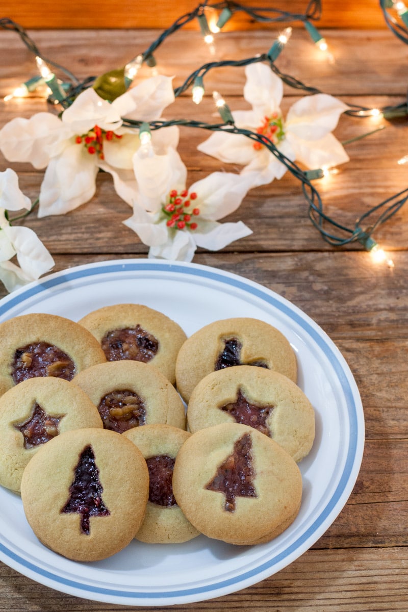 Jam filled cookies with Christmas Tree cutout, star cutout and circle cut out