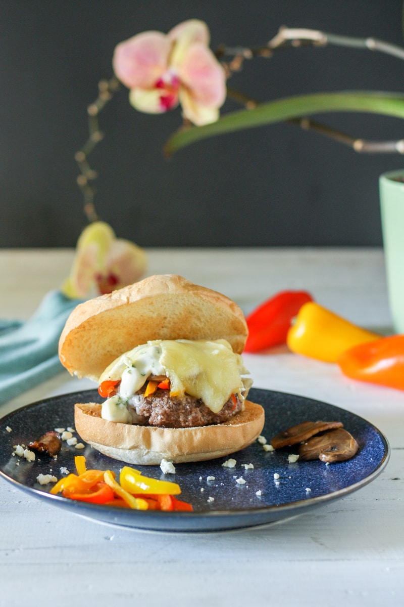lamb burger topped with feta and lemon garlic aioli for 4th of July recipe