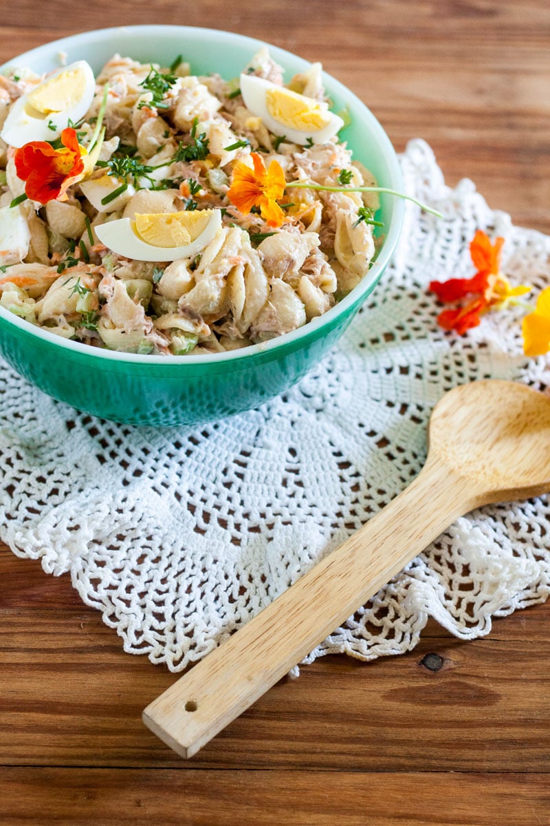 Close up of colorful macaroni salad.