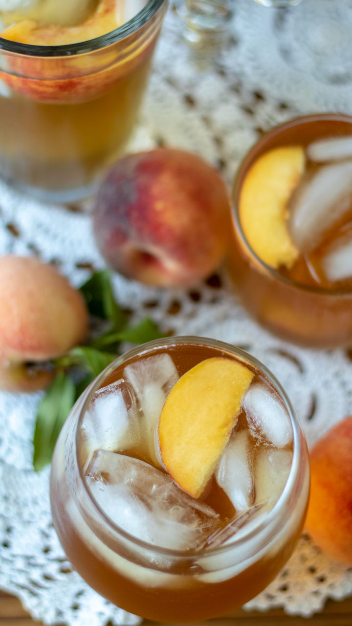 Overhead photo of glass of peach tea