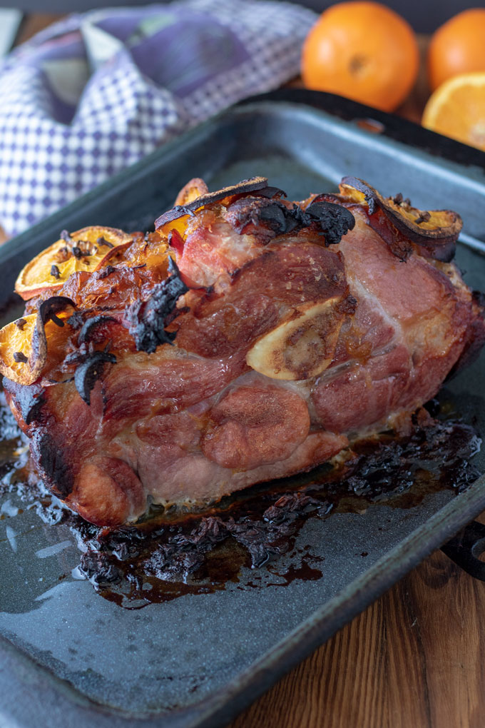 ham with bone in on metal roasting pan