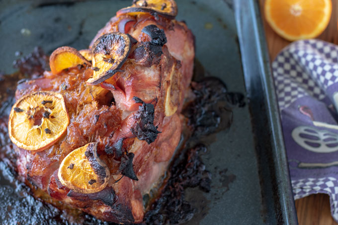 ham with pineapple and orange slices with cloves