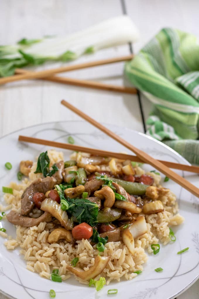Cashew pork stir fry on bed of rice.