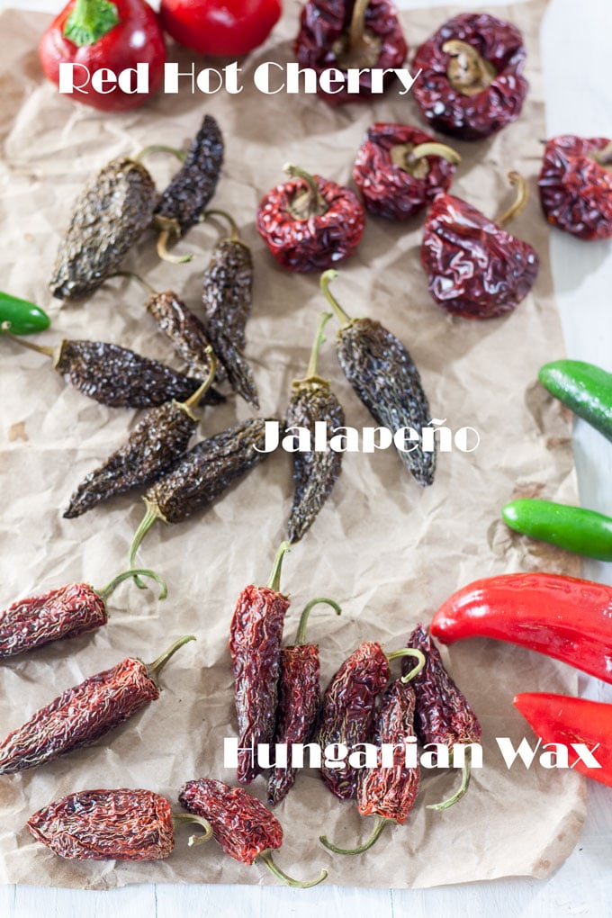 dried peppers arranged on brown paper