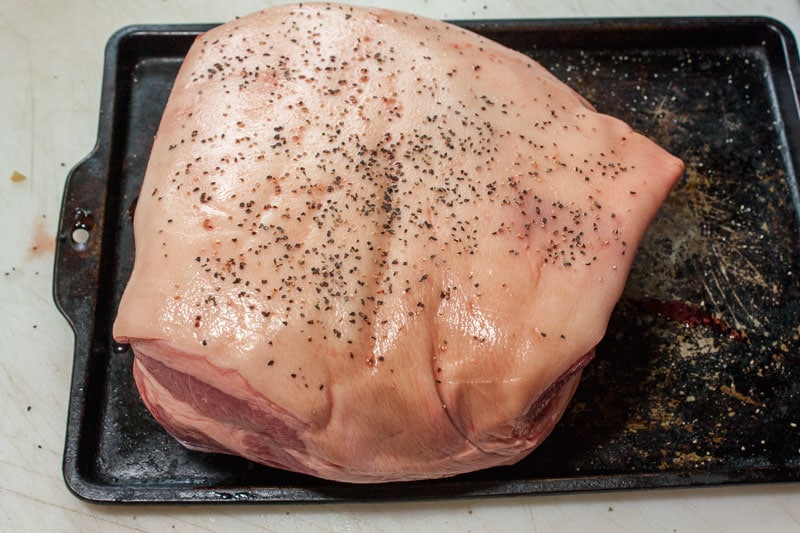 chunk of pork with salt and pepper added