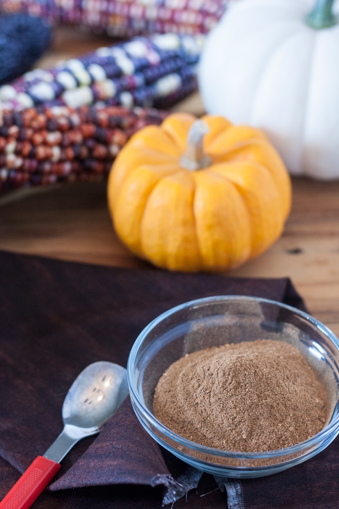 Mixed up pumpkin pie spice in glass bowl
