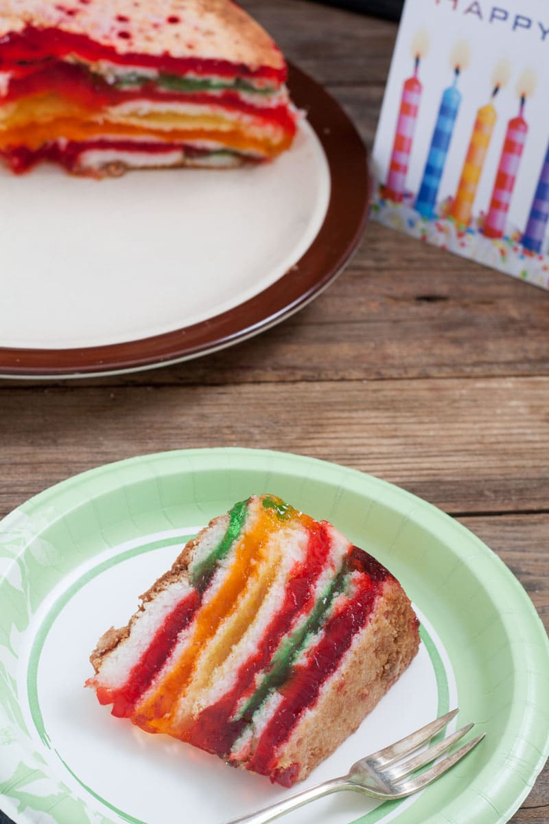 Rainbow Cake with silver spoon.