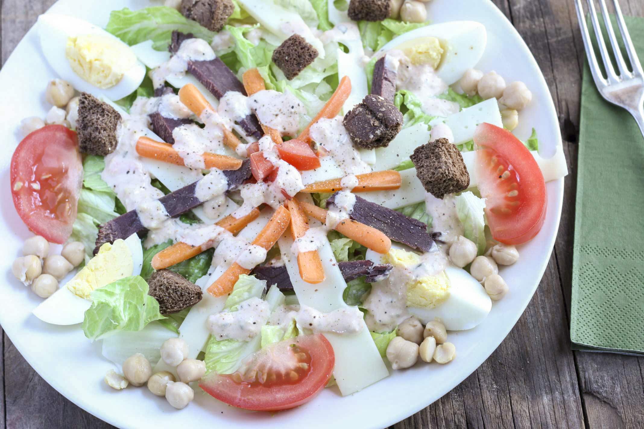 Reuben Dinner Salad drizzled with thousand island dressing