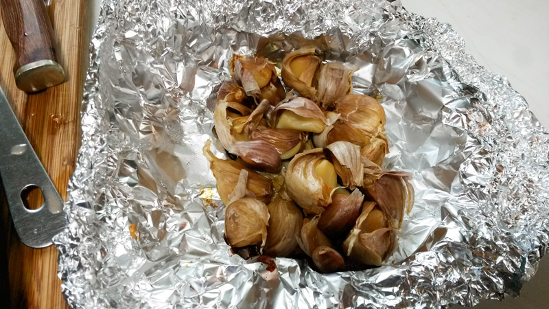 Roasted garlic on tin foil