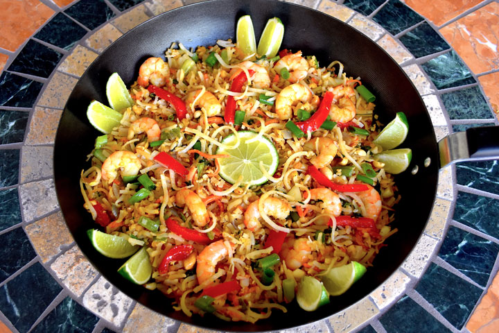 Large wok mounded with pad thai