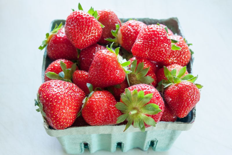 Quart of fresh strawberries.