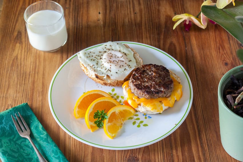 open faced venison breakfast sandwich with sausage, egg and cheese