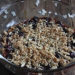 cherry coconut crisp in glass casserole