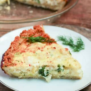 Crab and Shrimp Quiche Chunks of pink from the shrimp and green from the spinach dot this quiche with a golden crust