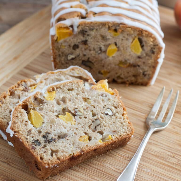 slices of peach bread on wooden board