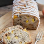 Peach Pecan Quick Bread with Caramel Glaze - Chunks of nuts and peaches in a golden quick bread glazed with caramel