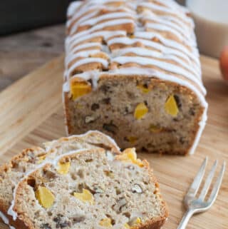 Peach Pecan Quick Bread with Caramel Glaze - Chunks of nuts and peaches in a golden quick bread glazed with caramel