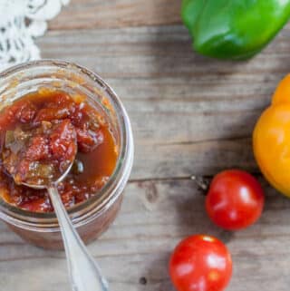 Jar Oscar Relish, which is red and green with a spoon scooping some out
