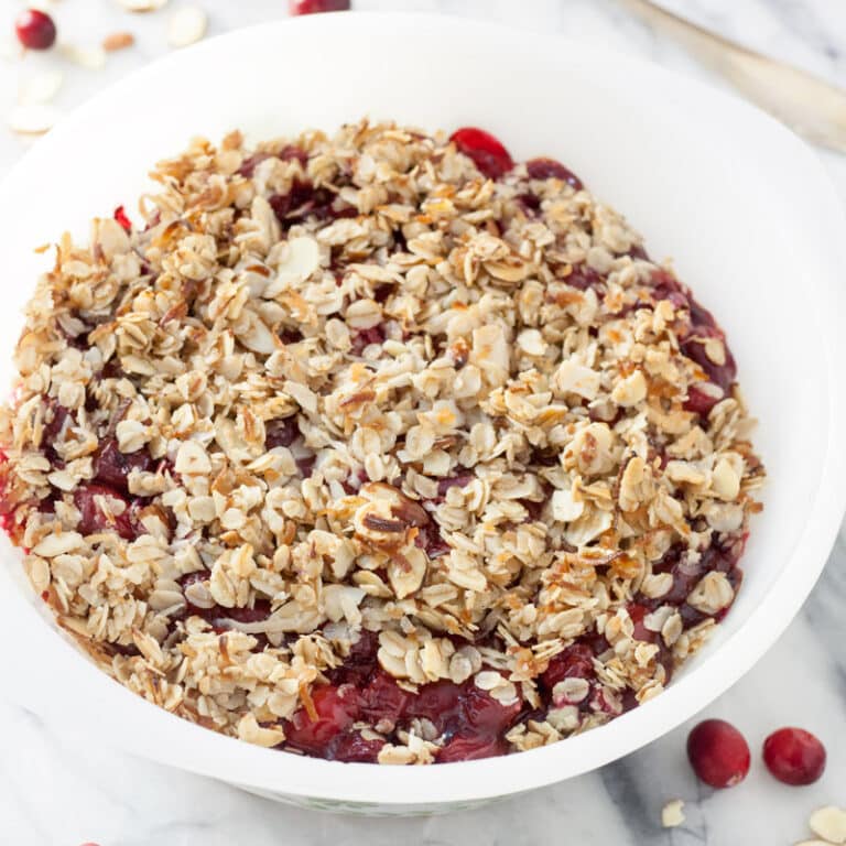 cranberry cherry crisp on marble board