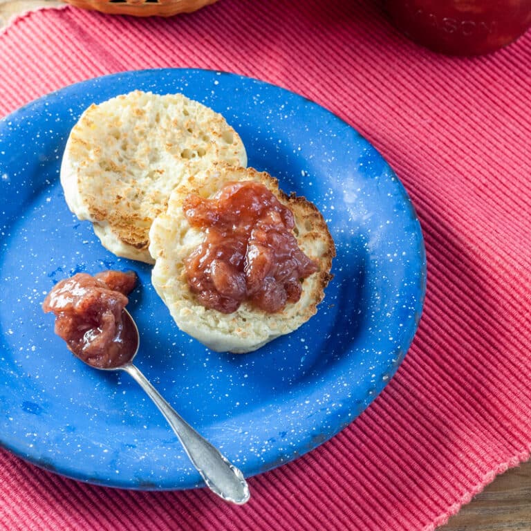 Strawberry jam on a toasted English muffin