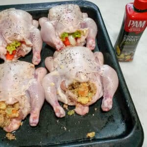 Stuffed Cornish Game Hens, raw, on Roasting pans