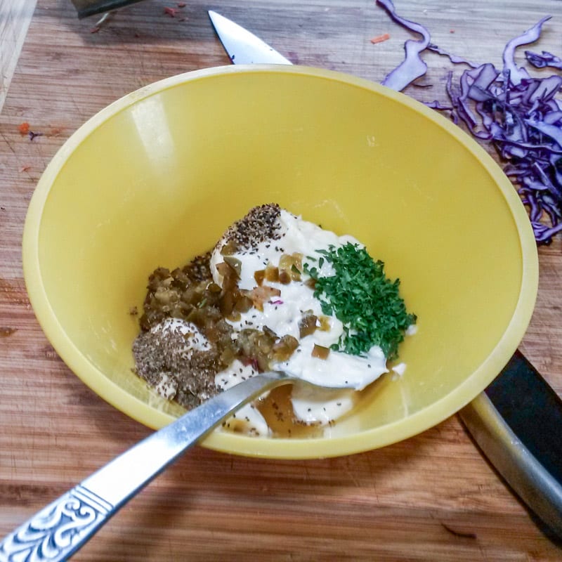 Small bowl with aioli ingredients.