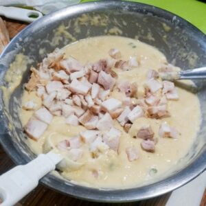 alligator meat added to dough.