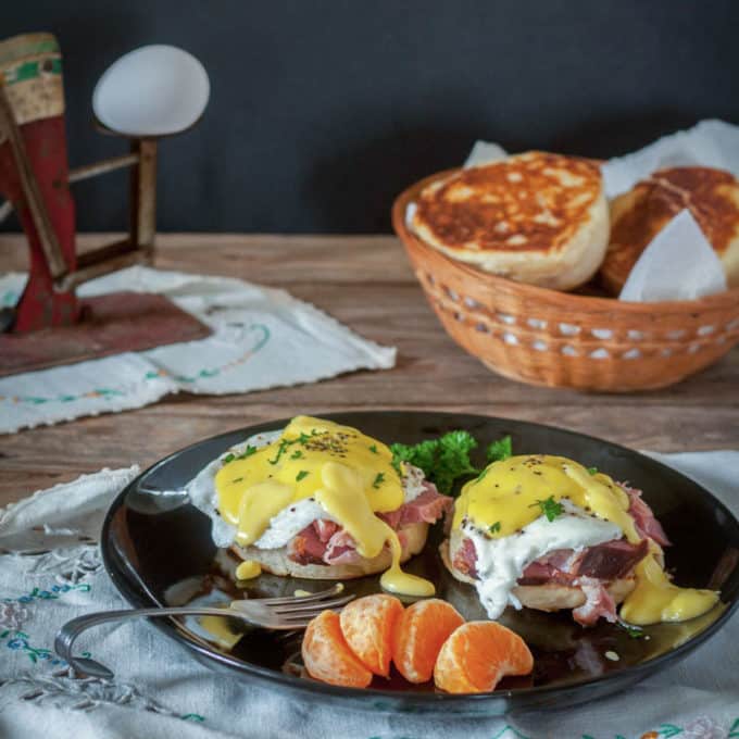 eggs benedict on black plate