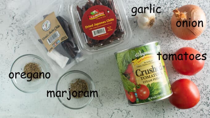 Step by step photographs of the process for making homemade enchilada sauce. See details in recipe below.